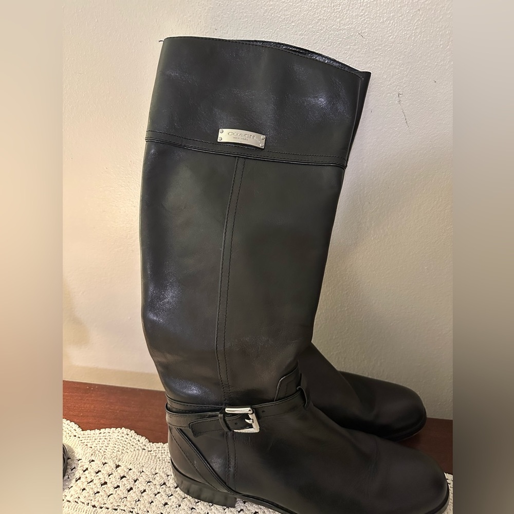 Mid-calf / knee high black Coach boots